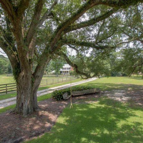 charming view of the park and farmhouse at Green Woods Stables RV Park